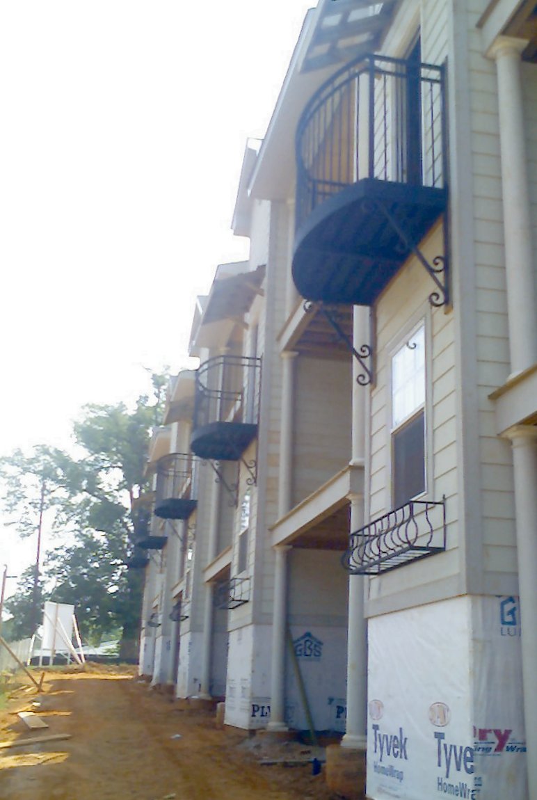 wrought iron planters and balconies
