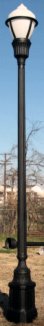 cast aluminum commercial grade street lamp with memphis design base and ballast box with globe guard
