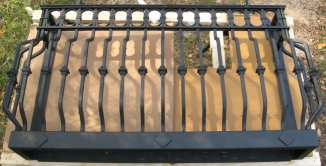 photo made at shop of uninstalled wrought iron balcony